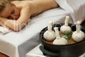 In spa. Traditional thai massage with salt bags