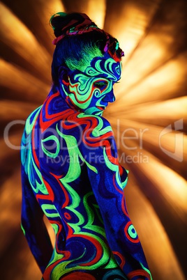 Clubbing. Image of nude girl with luminous bodyart