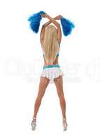 Rear view of leggy cheerleader with pom-poms