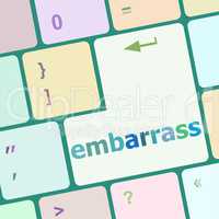 The word embarrass on a computer keyboard