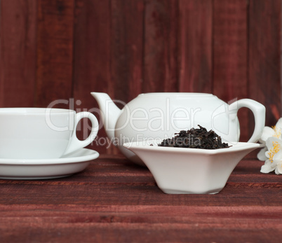 Dry black tea in a saucer