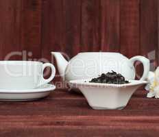Dry black tea in a saucer