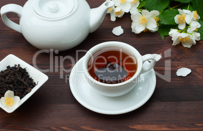 Hot black tea in a cup and saucer