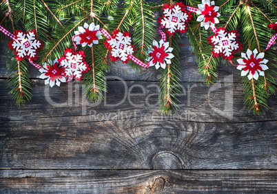 Christmas garland of spruce branches, and the felt snowflakes