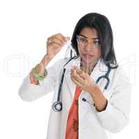 Female doctor doing medical test at lab