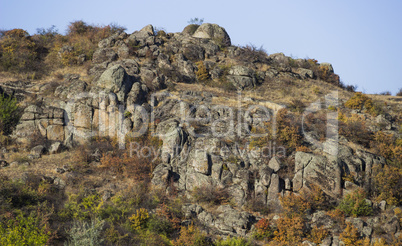 the stone wall of canyon