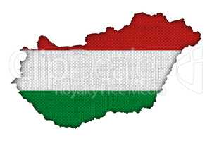 Karte und Fahne von Ungarn auf altem Leinen