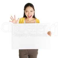 Asian girl holding white blank paper card