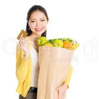 Grocery shopping woman and credit card