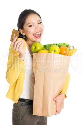 Grocery shopping female and credit card