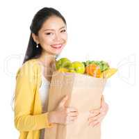 Grocery shopping Asian woman