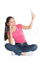Young Asian girl taking selfie with smartphone