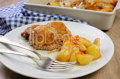 Pieces of chicken with potatoes
