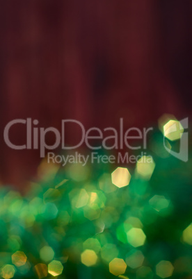 Christmas brown background with green bokeh
