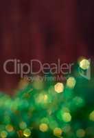 Christmas brown background with green bokeh