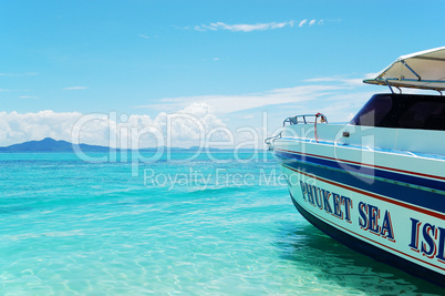 Motor boat on turquoise water of Indian Ocean, Phi Phi island, T