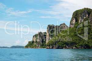 Beach with motor boats on turquoise water, Phi Phi island, Thail