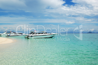 Motor boats on turquoise water of Indian Ocean, Phi Phi island,
