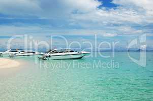 Motor boats on turquoise water of Indian Ocean, Phi Phi island,