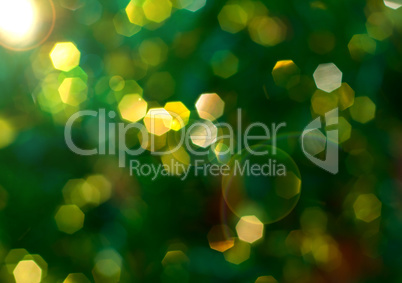 Green background with yellow bokeh, blurred background