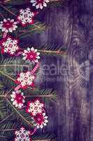 Christmas gray wooden background c decorated fir branch