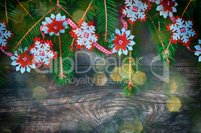 Christmas gray wooden background with colored bokeh and decorate