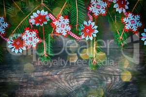 Christmas gray wooden background with colored bokeh and decorate