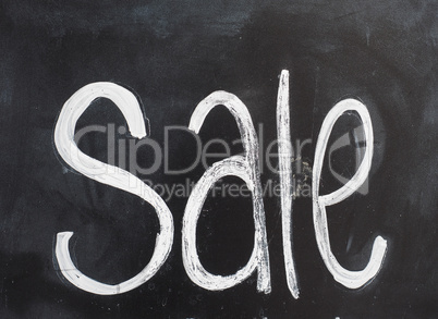 Sale sign on blackboard