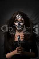 Glamour version of Santa Muerte. Sexy model posing