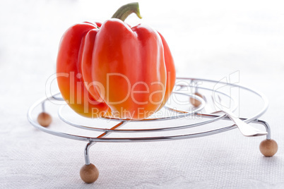 Red Fresh Pepper on the white table