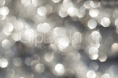 silver and white bokeh lights defocused