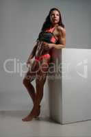 Full length photo of female bodybuilder posing