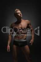 Advertising underwear. Photo of sexy man in briefs
