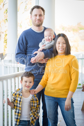 Young Mixed Race Chinese and Caucasian Family Portrait