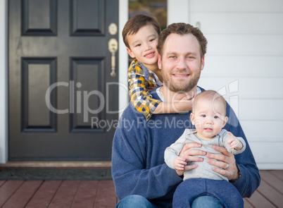 Mixed Race Father and Sons on Front Porch