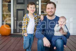 Mixed Race Father and Sons on Front Porch