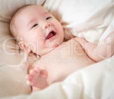 Mixed Race Baby Boy Having Fun on His Blanket