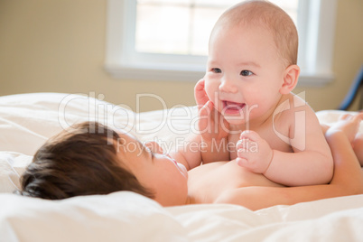 Mixed Race Chinese and Caucasian Baby Brothers Having Fun Laying