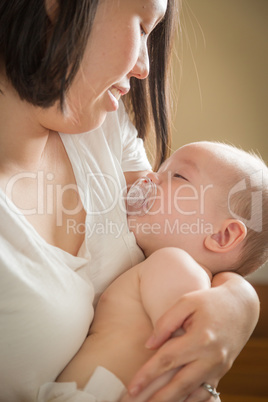 Mixed Race Chinese and Caucasian Baby Boy with His Mother