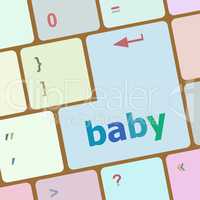 Keyboard with baby word on computer button