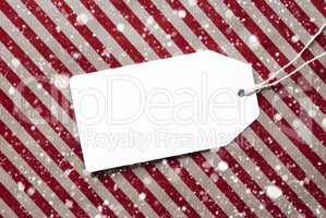 Label On Red Wrapping Paper And Copy Space, Snowflakes