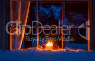 Snowy Wooden Window, Christmas Decoration and Candles