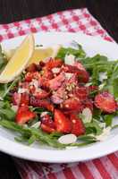 Arugula salad with strawberries