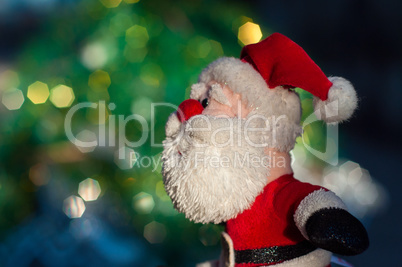 Cloth Santa Claus on a blurred background