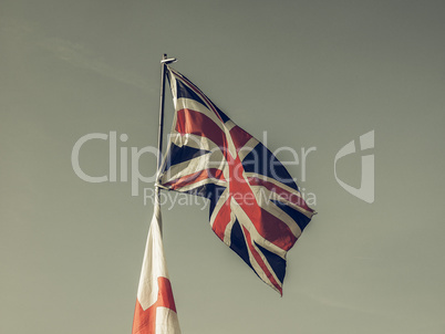 Vintage looking Flag of UK over blue sky