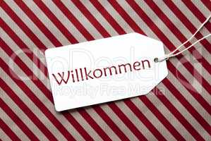 Label On Red Wrapping Paper, Willkommen Means Welcome