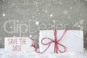 Gift, Cement Background With Snowflakes, English Text Save The Date