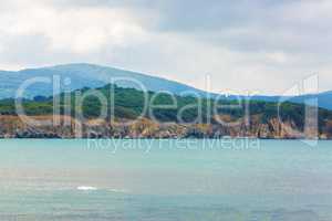 Rocks, mountains and sea