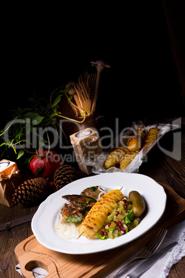 fried liver with fried potato and salt cucumbers