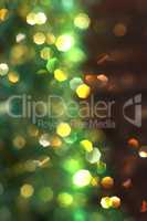Christmas background with green and yellow bokeh